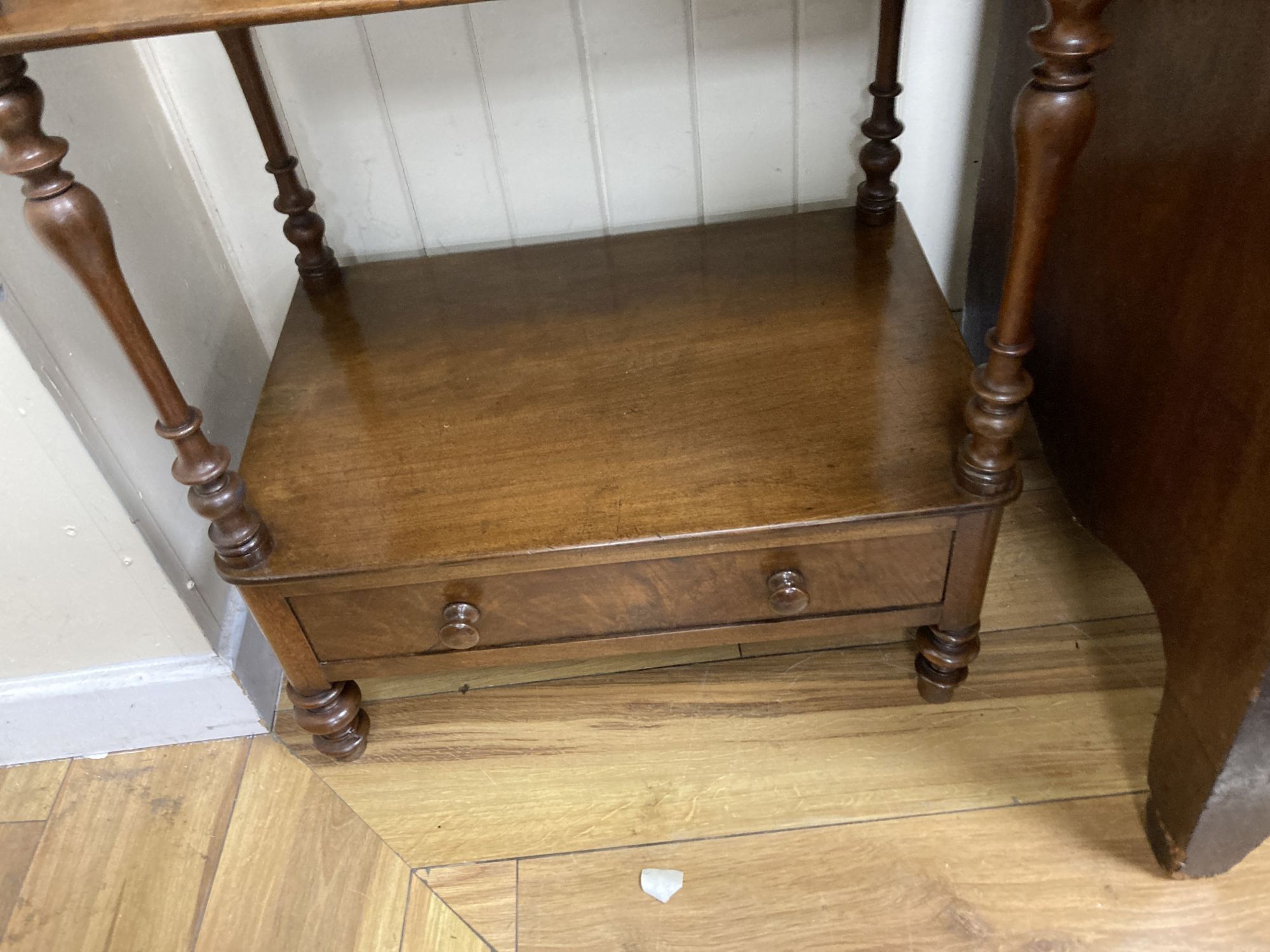 A Victorian mahogany three tiered whatnot with drawer, width 56cm, depth 37cm, height 104cm